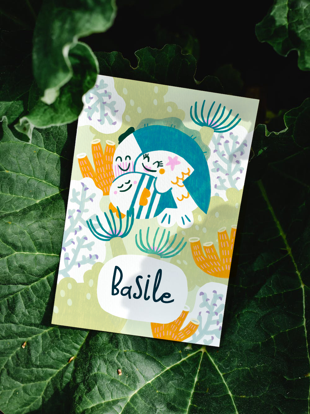 faire part Basile mockup du faire part de basile avec des poissons qui s'enlassent et des corails